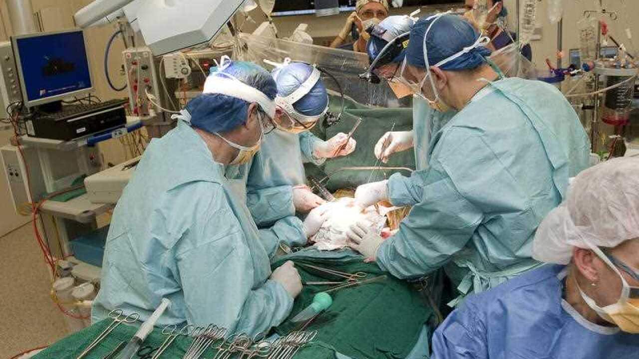 A supplied undated image obtained Friday, March 30, 2012 of doctors perform surgery on Mohamed El Shazly's at the Royal Children's Hospital in Melbourne last week. Mohamed El Shazly, 13, has become Australia's first paediatric intestinal transplant recipi