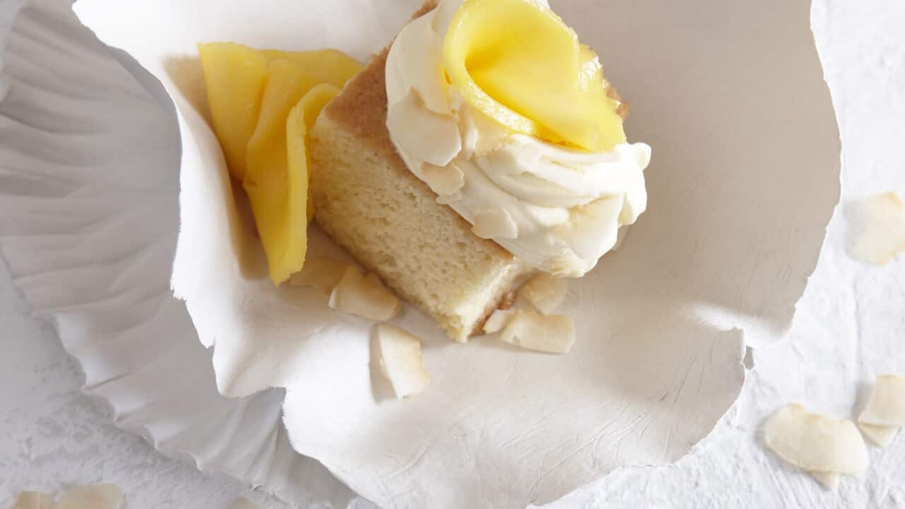 Vanilla tres leche cake with double cream and mango