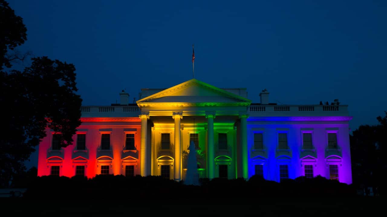 The White House is illuminated in celebration after the Supreme Court ruled that the Constitution guarantees a right to same-sex marriage, on Friday, June 26, 2015, in Washington. (AP Photo/Evan Vucci)