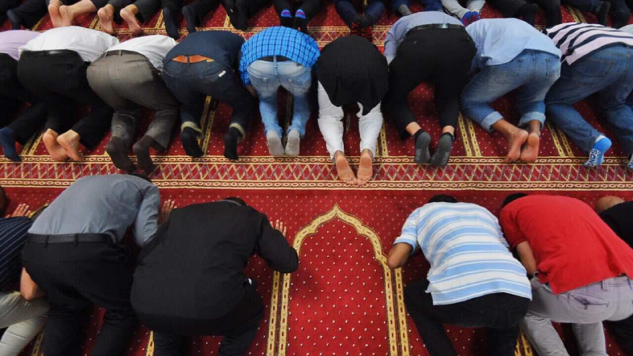 Worshippers pray at Parramatta Mosque