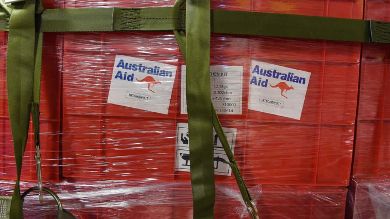 Aid is seen onboard an Australian RAAF