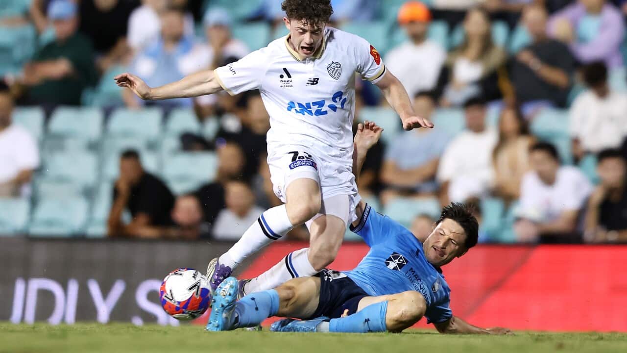 Jesse Randall of Auckland FC is tackled by Joe Lolley of Sydney FC during the A-League Men’s match between Sydney FC and Auckland FC in Liechhardt Oval in Sydney, Tuesday, February 17, 2026