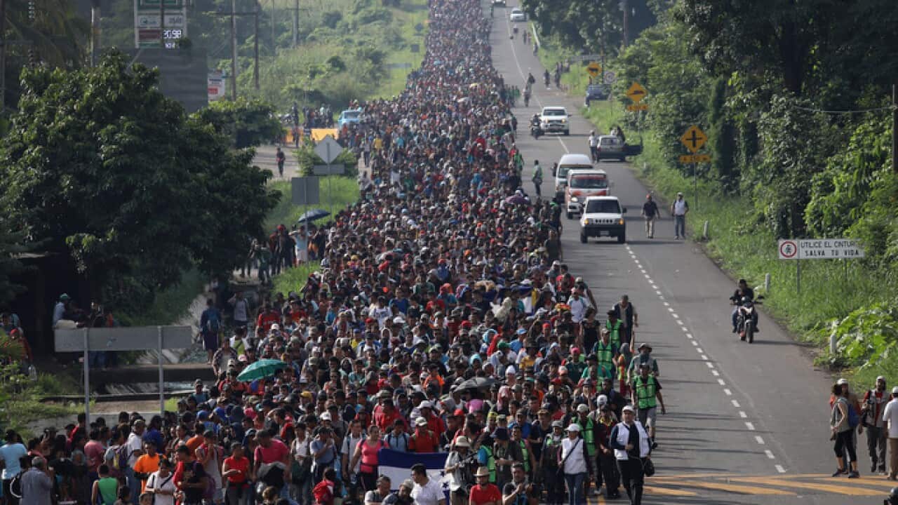 Migrant Caravan Crosses Into Mexico