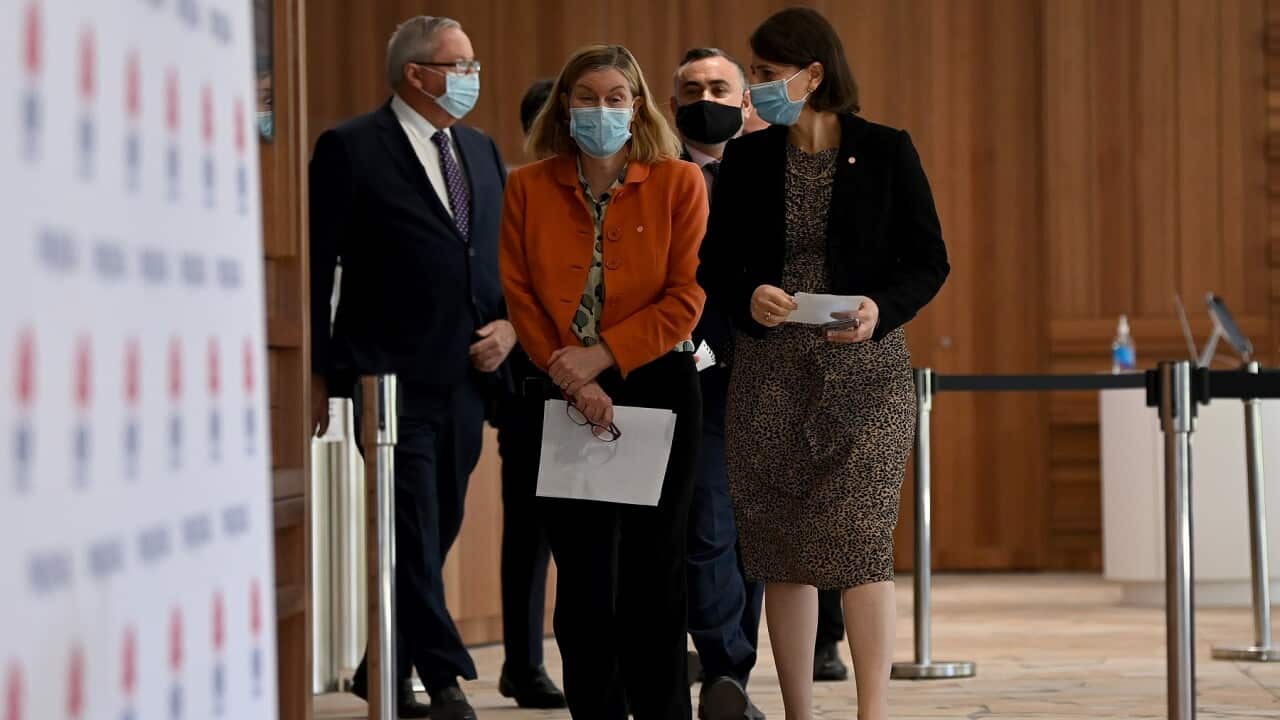 NSW Chief Health Officer Dr Kerry Chant and Premier Gladys Berejiklian arrive for a COVID-19 press conference