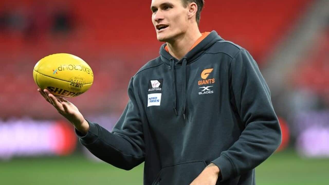 Rory Lobb of the Giants walks on the pitch.