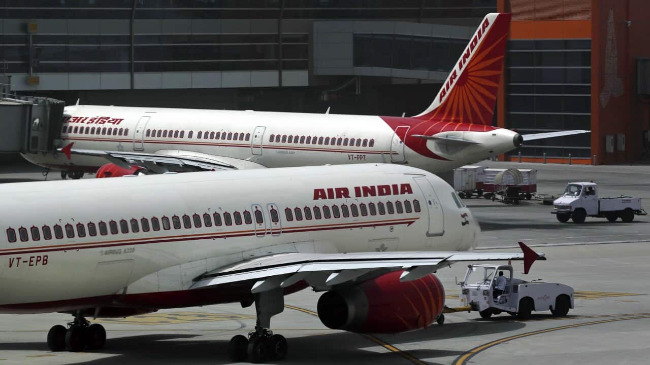 Air India planes are parked on the tarmac at the Terminal 3 of Indira Gandhi International Airport in New Delhi, India.