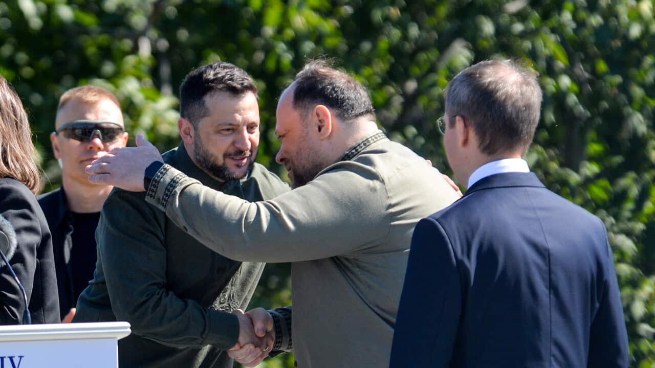 Zelenskyy embraces Ukraine Parliament speaker (AAP)