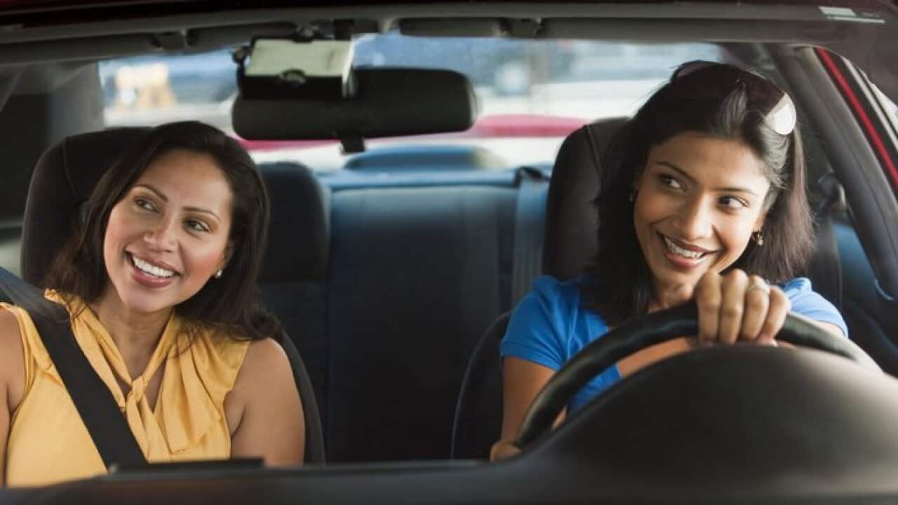 Friends driving in car together