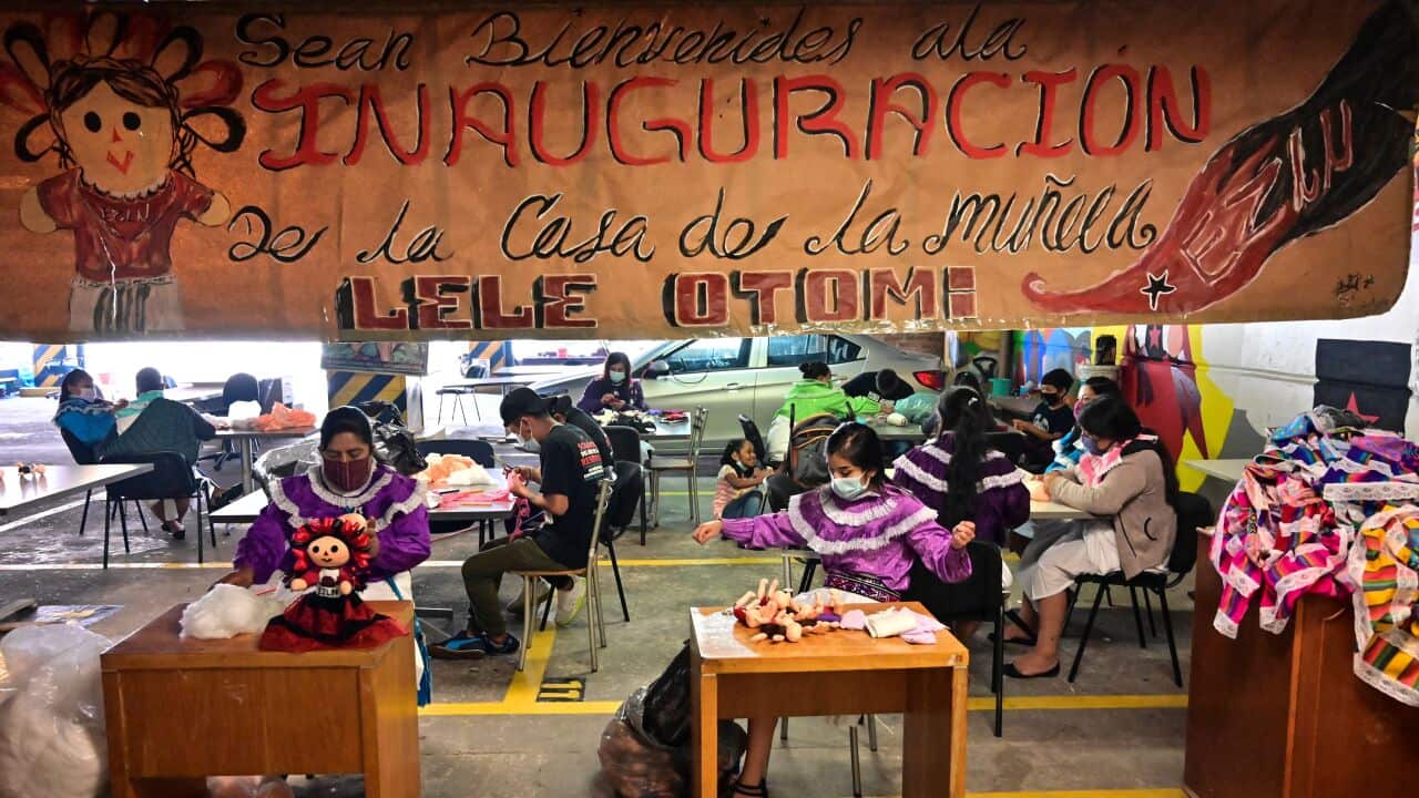 Members of the Otomi indigenous community work in the elaboration of rag dolls in Mexico City, on 31 August 2021.