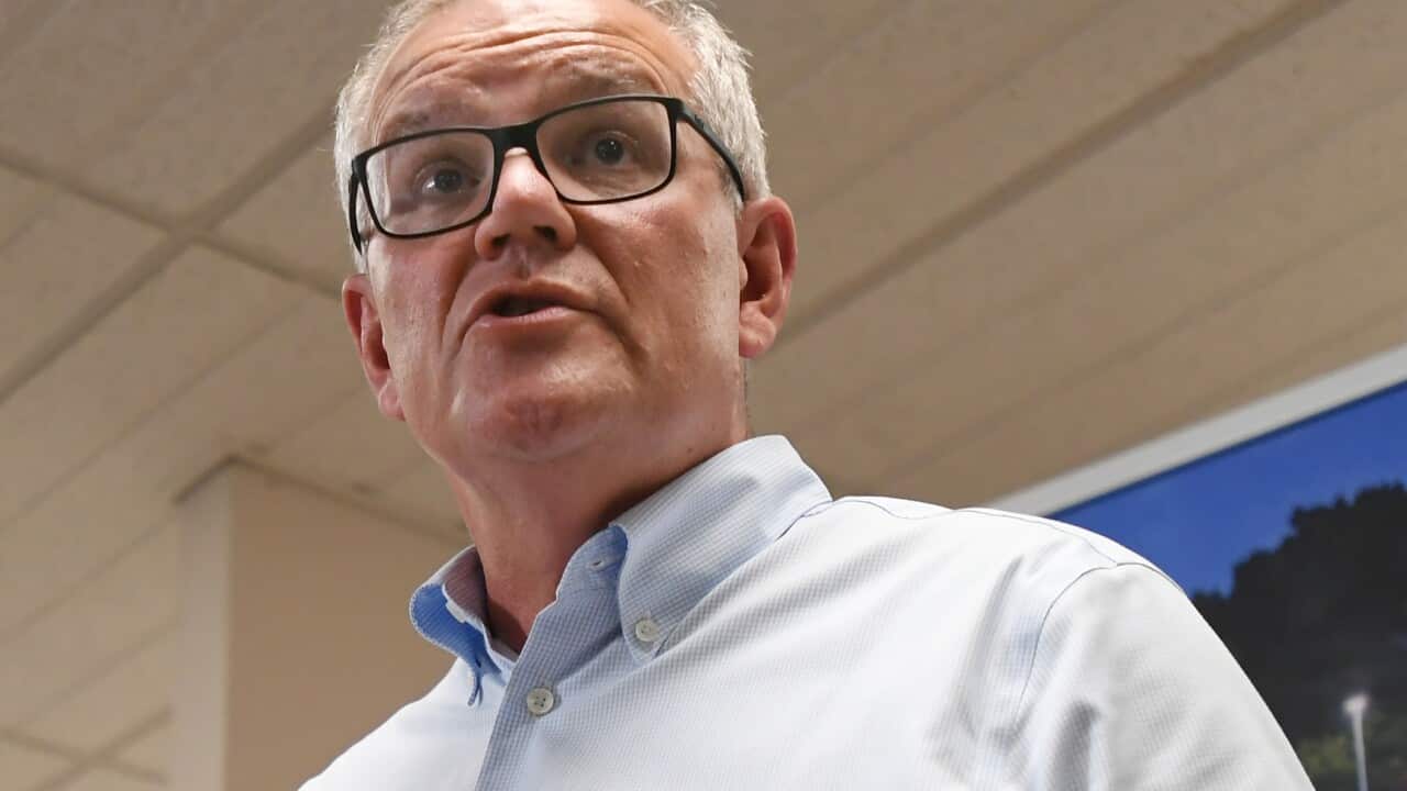 Prime Minister Scott Morrison is seen speaking at a press conference.