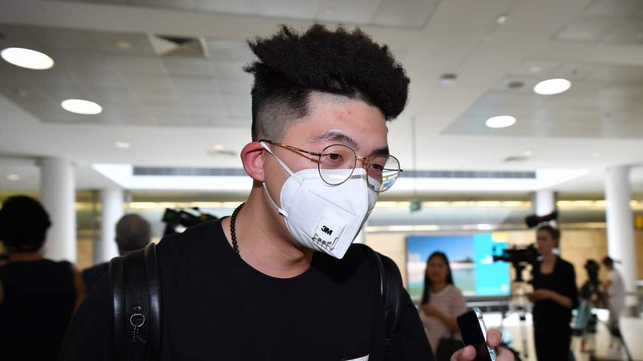 Passenger with face mask.