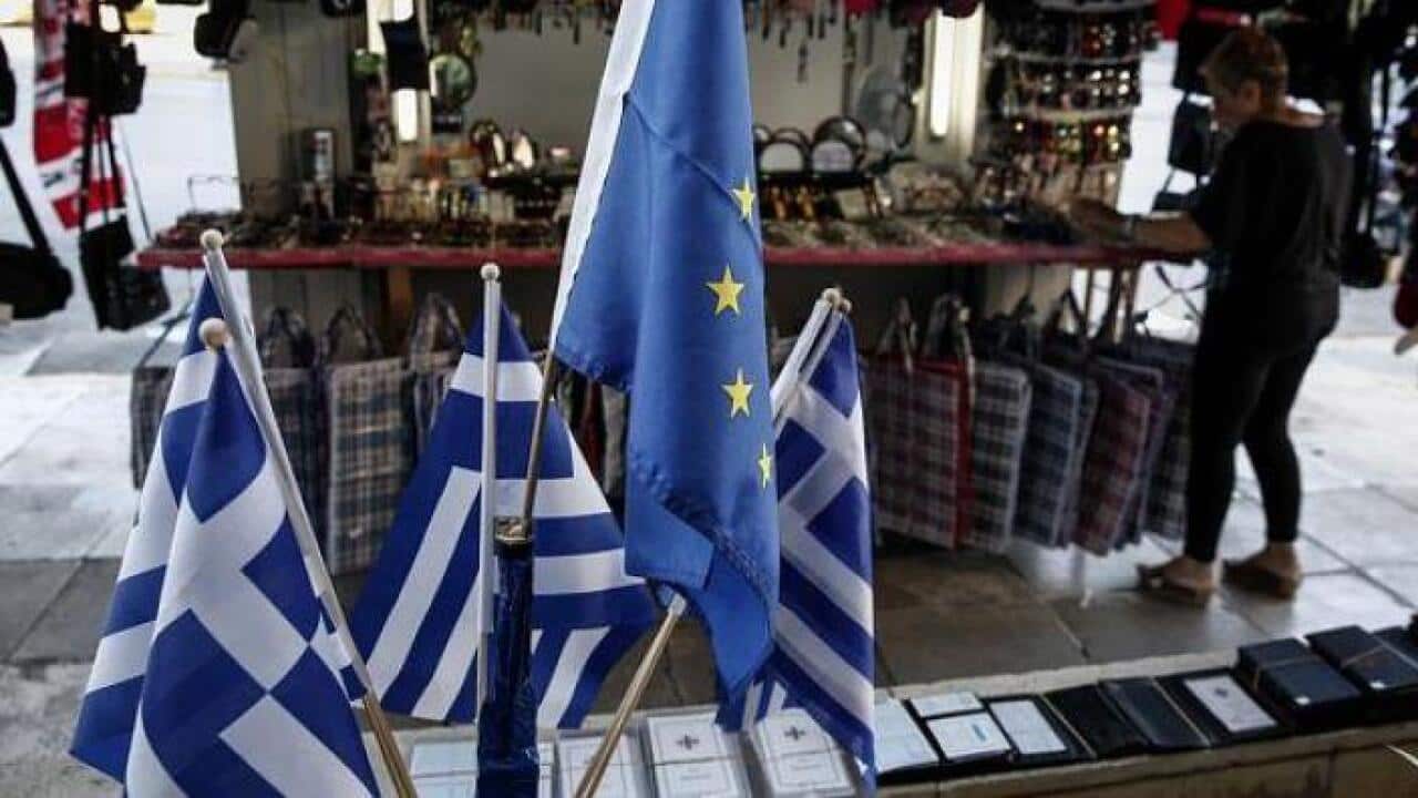 Greece postpones IMF payment, snap elections possible. (AAP)