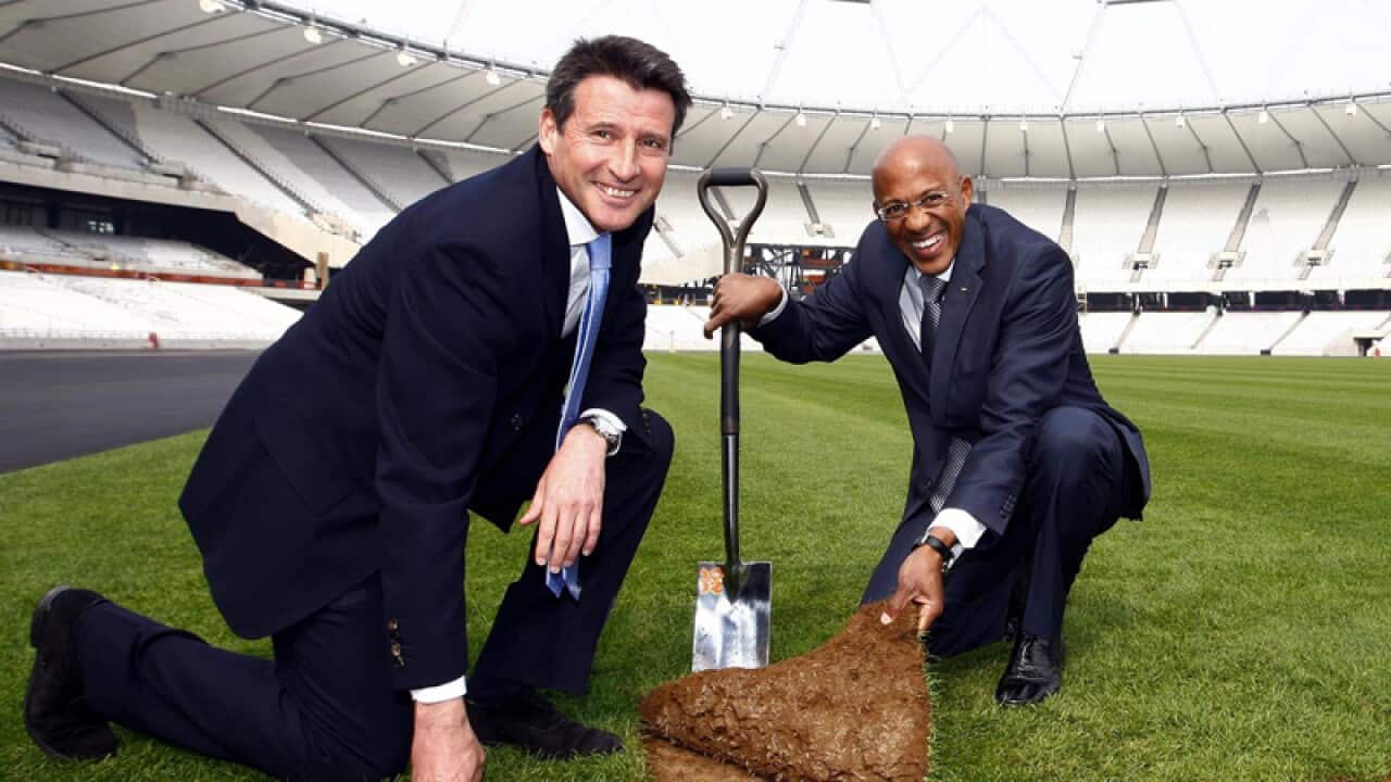 LOCOG Chairman Seb Coe and Olympian Frank Fredericks (R)