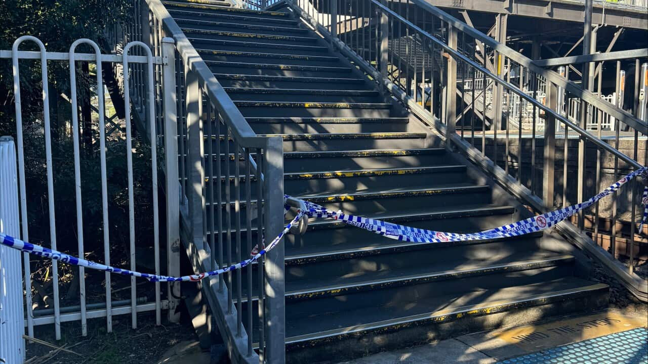 Police tape cordon off steps