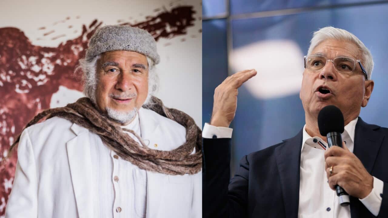 A two-way image of a man wearing a white suit and coloured scarf standing in front of an artwork, and another man in a suit speaking into a microphone