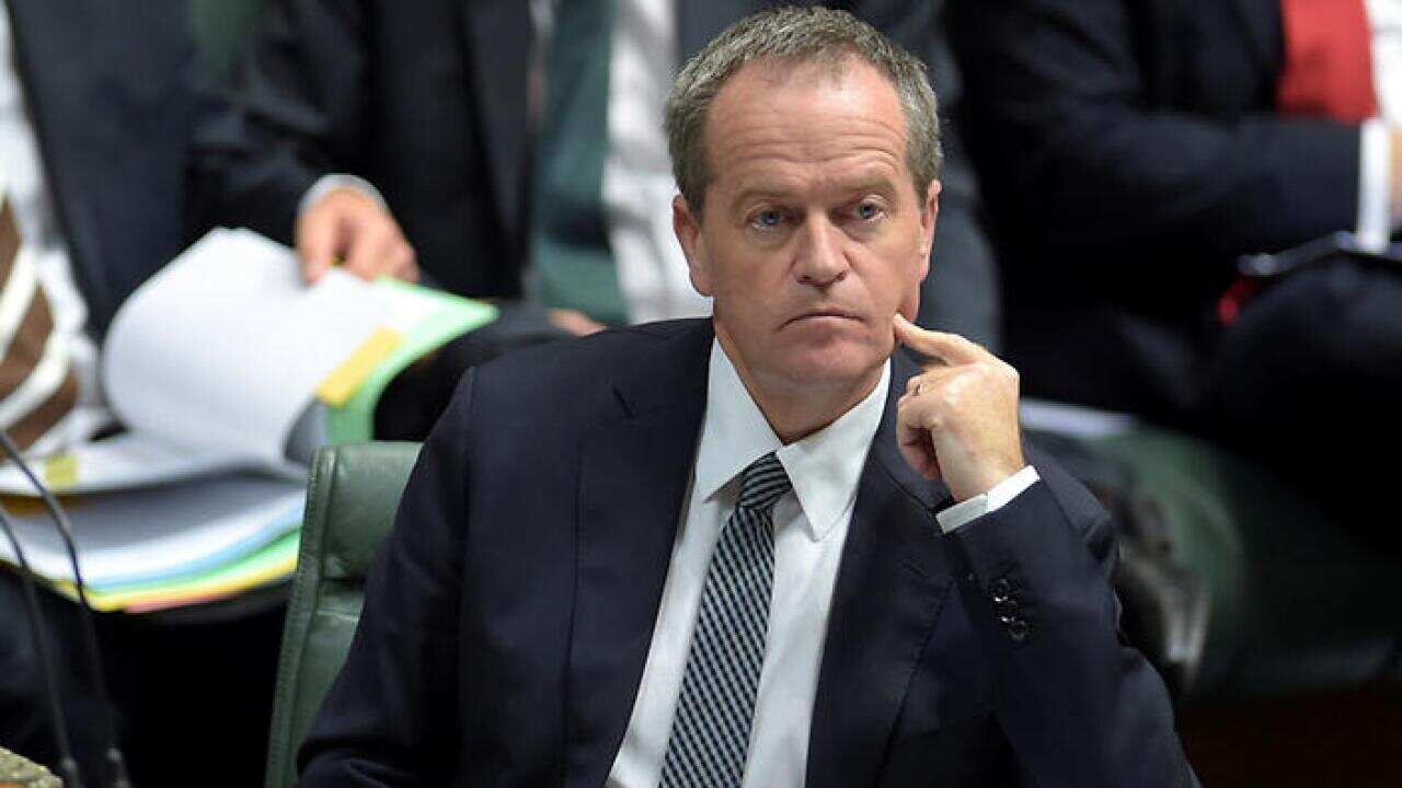 Federal Opposition Leader Bill Shorten reacts during House of Representatives Question Time at Parliament House in Canberra, Thursday, June 4, 2015. (AAP Image/Lukas Coch) NO ARCHIVING