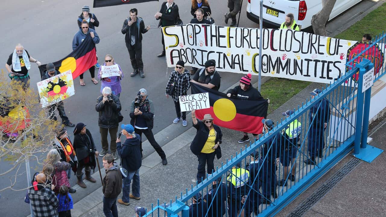 Protestors outside the NAIDOC meeting.