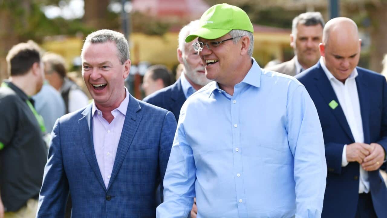 Prime Minster Scott Morrison is seen with Minister for Defence Industry Christopher Pyne (left) during a visit to the Glenelg 