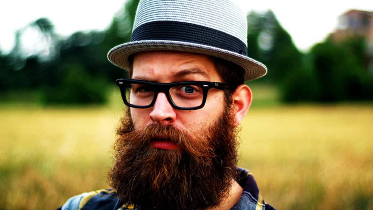 New research suggests the beard styles embraced by hipster culture are likely to grow less attractive as they become more popular (Juan Luis/Flickr)