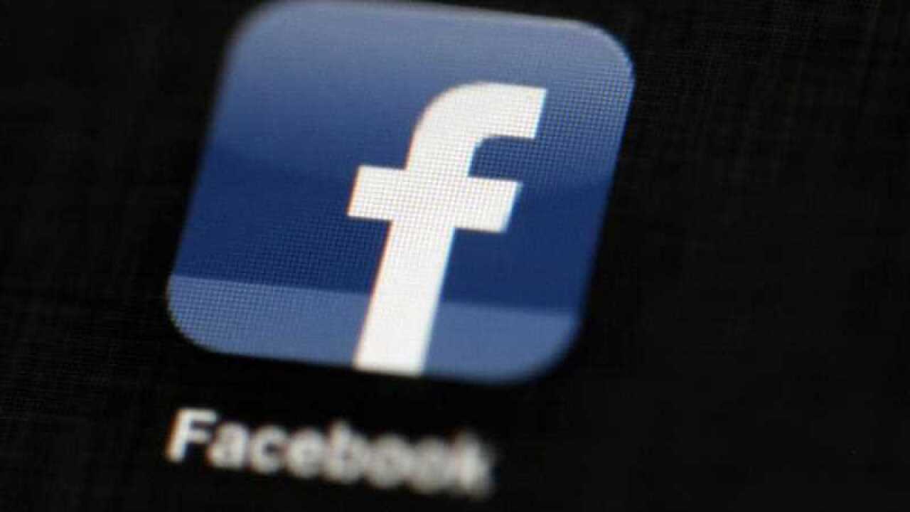 In this May 16, 2012, file photo, the Facebook logo is displayed on an iPad in Philadelphia.