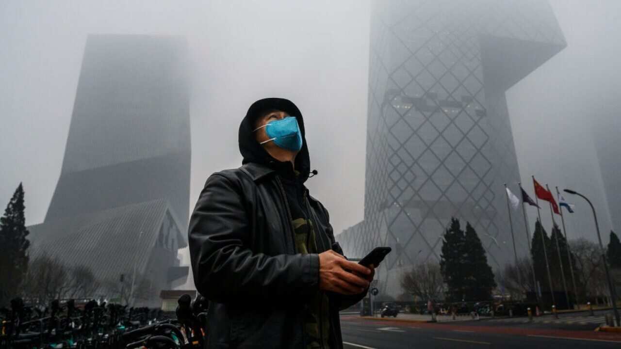 A man wears a face mask in Beijing