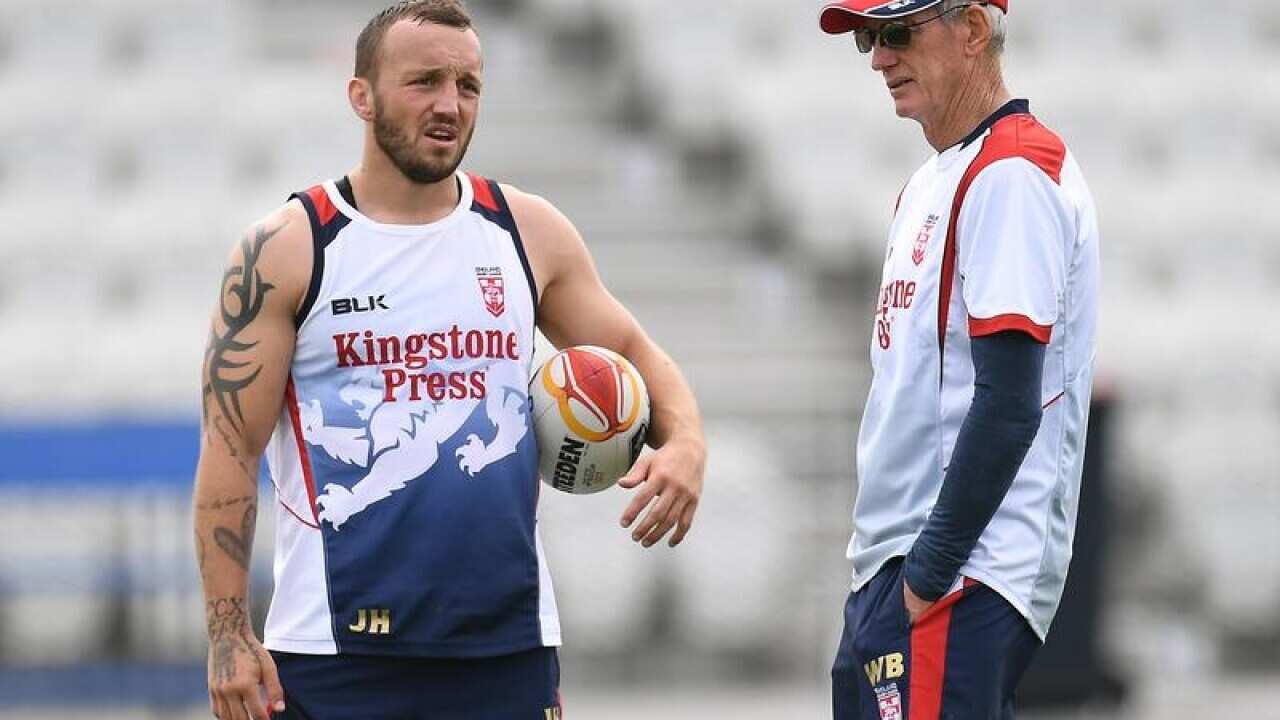 England coach Wayne Bennett (R) speaks with Josh Hodgson