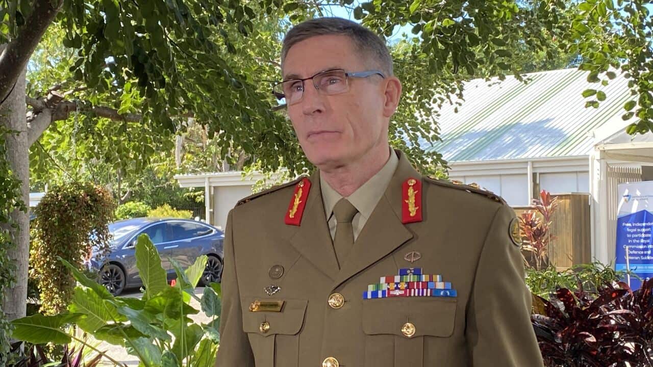 A man standing in army uniform