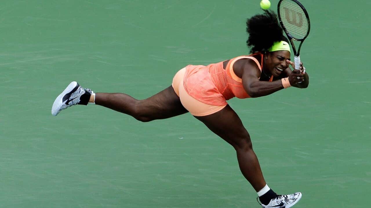 Serena Williams returns a shot against Kiki Bertens, of the Netherlands, during the second round of the U.S. Open tennis tournament, Wednesday, Sept. 2, 2015, in New York. (AP Photo/Matt Rourke)