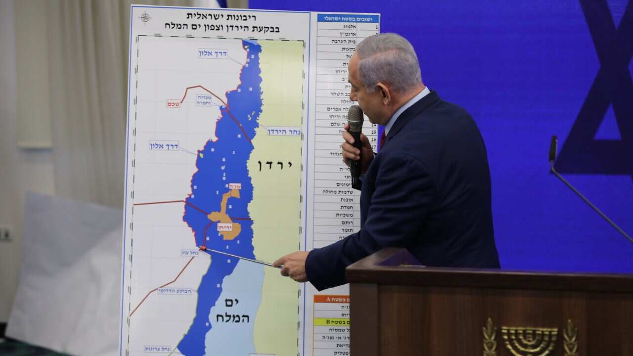 Israeli Prime Minister Benjamin Netanyahu with a map of the Jordan Valley