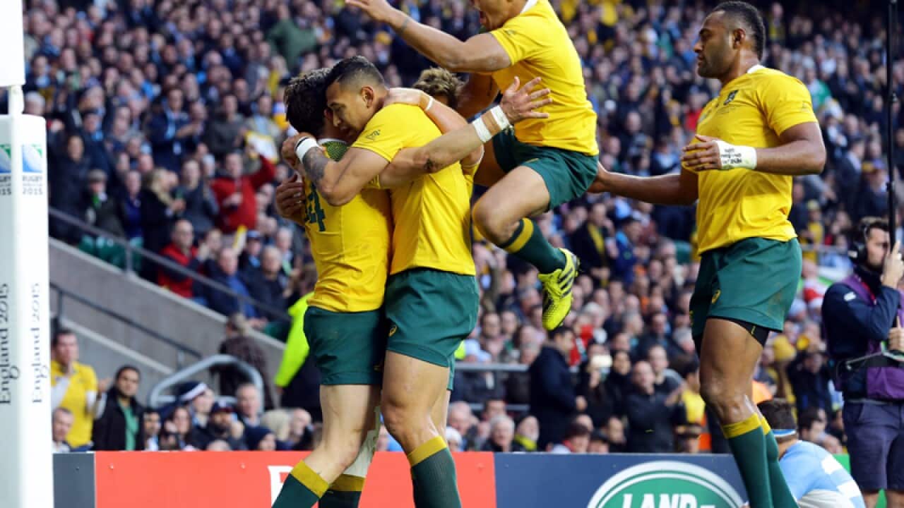 Wallabies celebrate at Twickenham Stadium.
