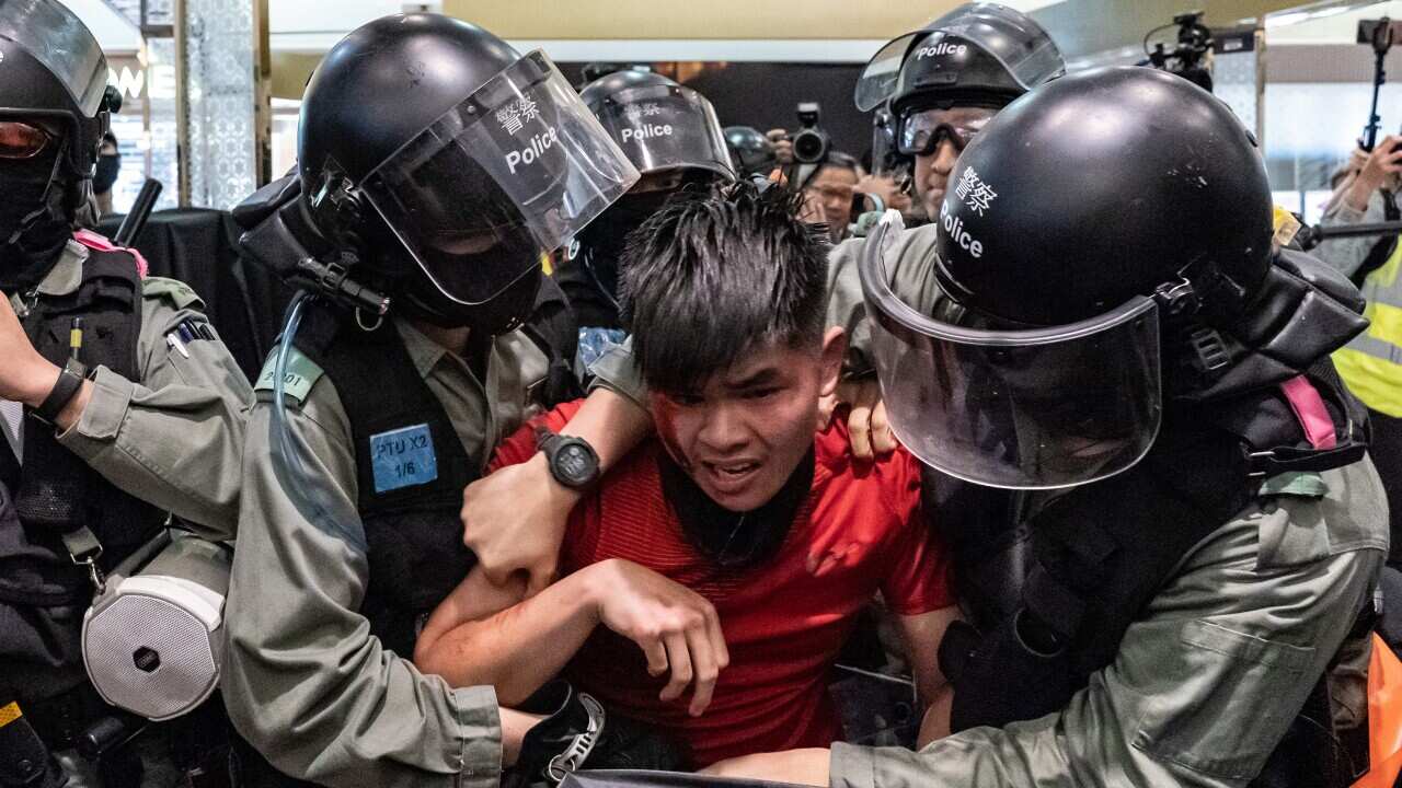 A man was detained by riot police during a demonstration in a shopping mall at Sheung Shui district.