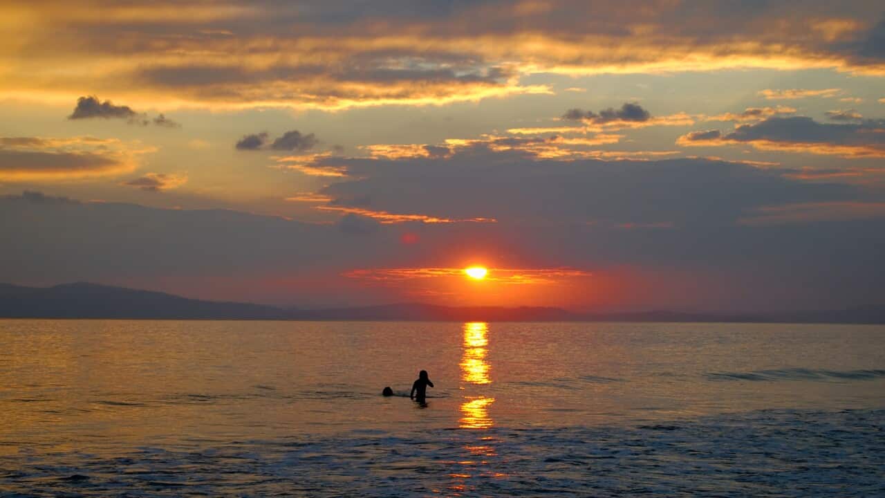 Red setting sun on Radhanagar Beach of Havelock Island, Andaman and Nicobar Islands
