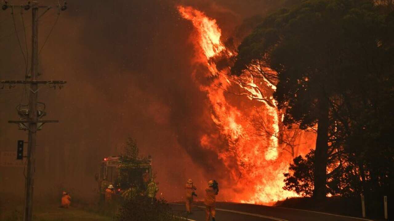 A fire truck is seen during a bushfire near Bilpin, 90km north west of Sydney, during Australia's horror bushfire season.