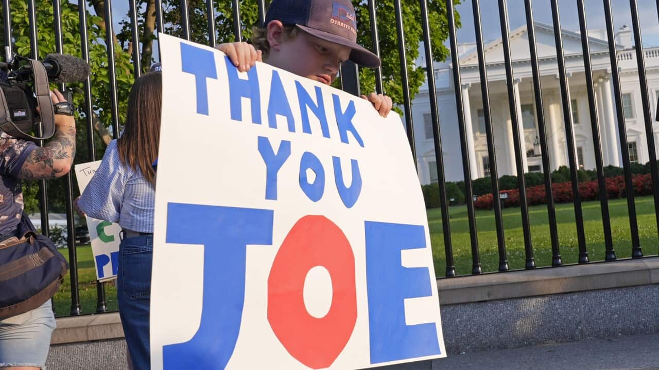 10-year-old Hugh Kieve and his family come out to show support for President Joe Biden (AAP).jpg