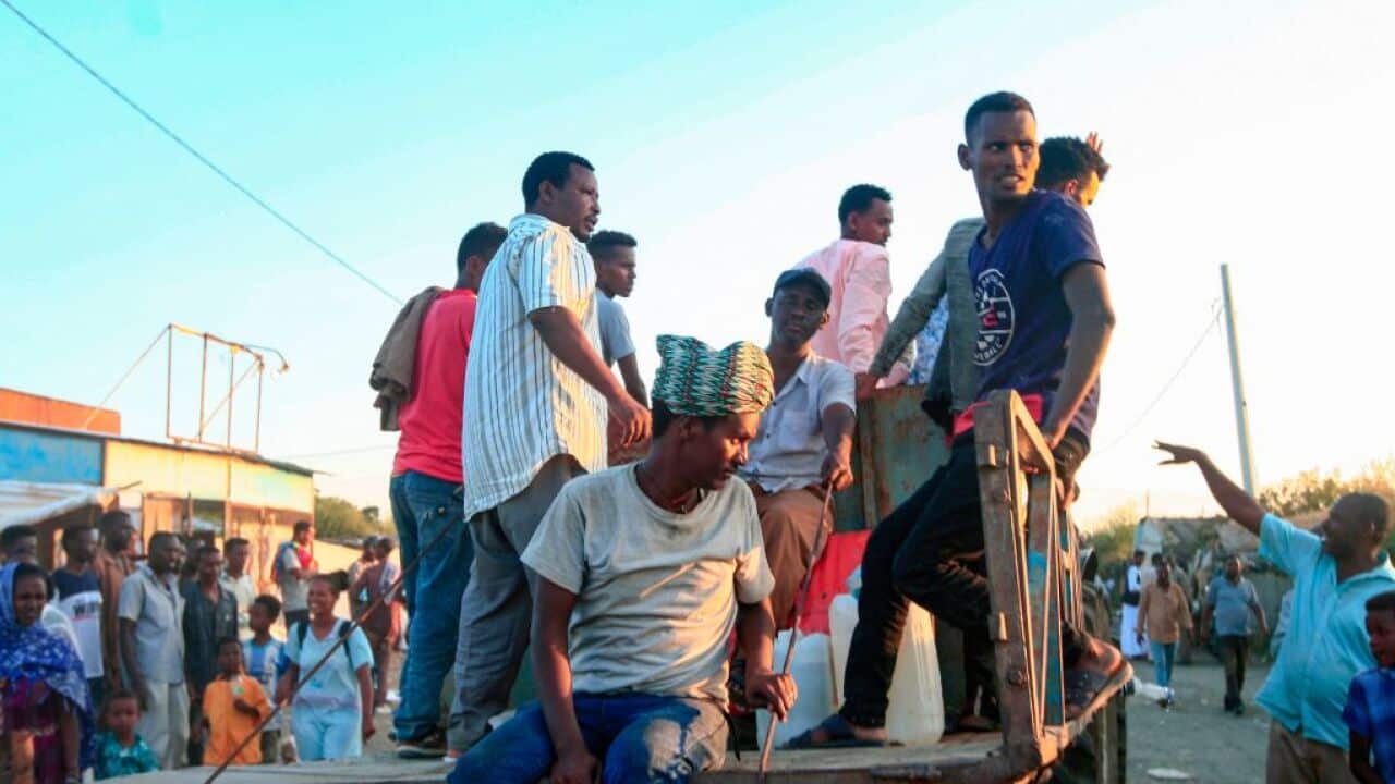 Ethiopians fleeing fighting in Tigray gather in a bordering Sudanese village east of the town of Gadaref on November 13, 2020.