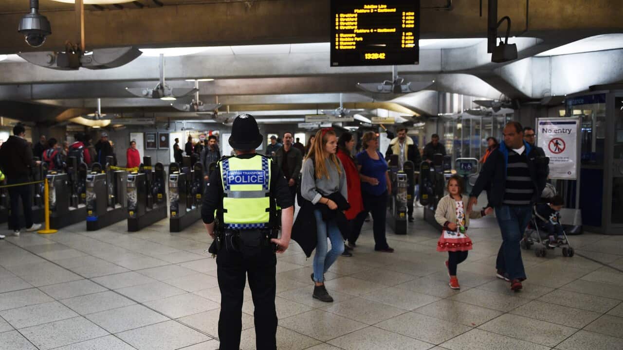 Police patrol the London Underground after the terror level was increased following an attack at Parsons Green Tube station.