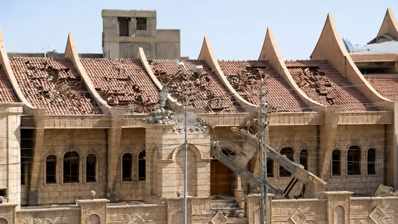 كنيسة بهنام وسارة في منطقة بغديدا (سهل نينوى في العراق) بعد تدميرها على يد داعش عام 2014.png