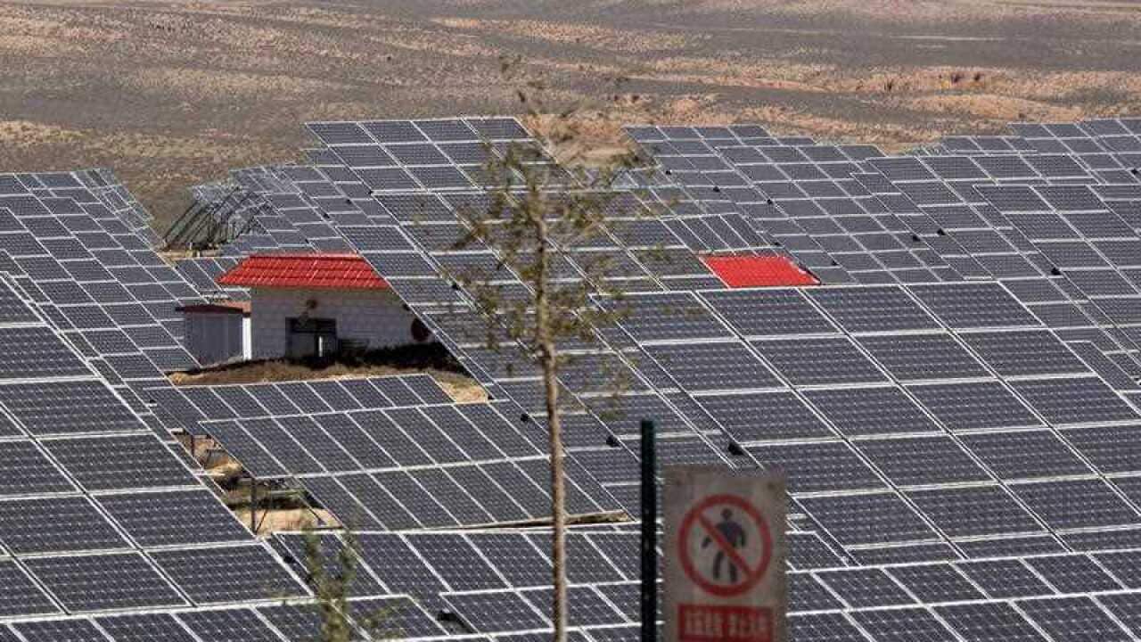 Solar panels at a solar power farm soaks in the sun in northwestern China's Ningxia Hui autonomous region
