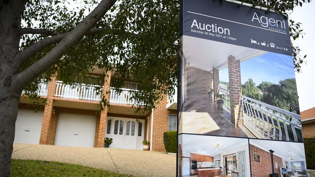 An auction sign at a Canberra house.
