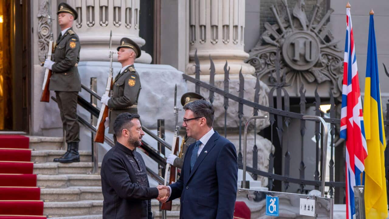 UK and Ukraine leaders shake hands in Kyiv 24 Aug (AAP)