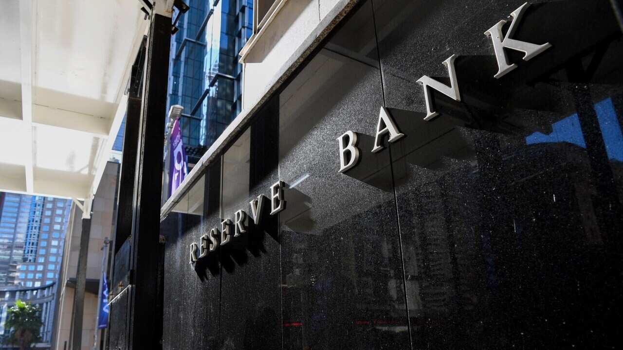 A pedestrian walks past the Reserve Bank of Australia (RBA) head office in Sydney, Tuesday, June 7, 2022. The Reserve Bank of Australia board holds its monthly meeting ahead of an announcement on interest rates. (AAP Image/Bianca De Marchi) NO ARCHIVING