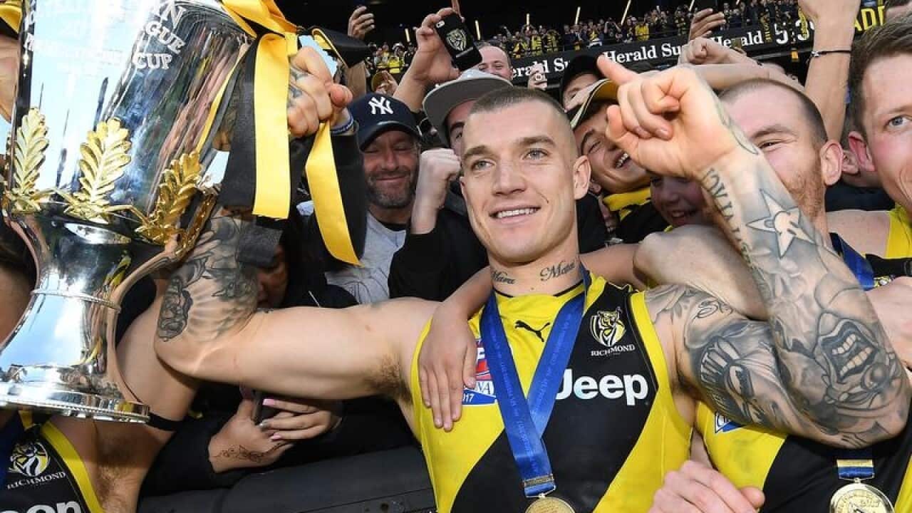 Richmond players celebrate their AFL grand final win