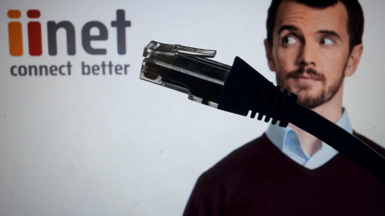 An ethernet cable in front of an iiNet logo