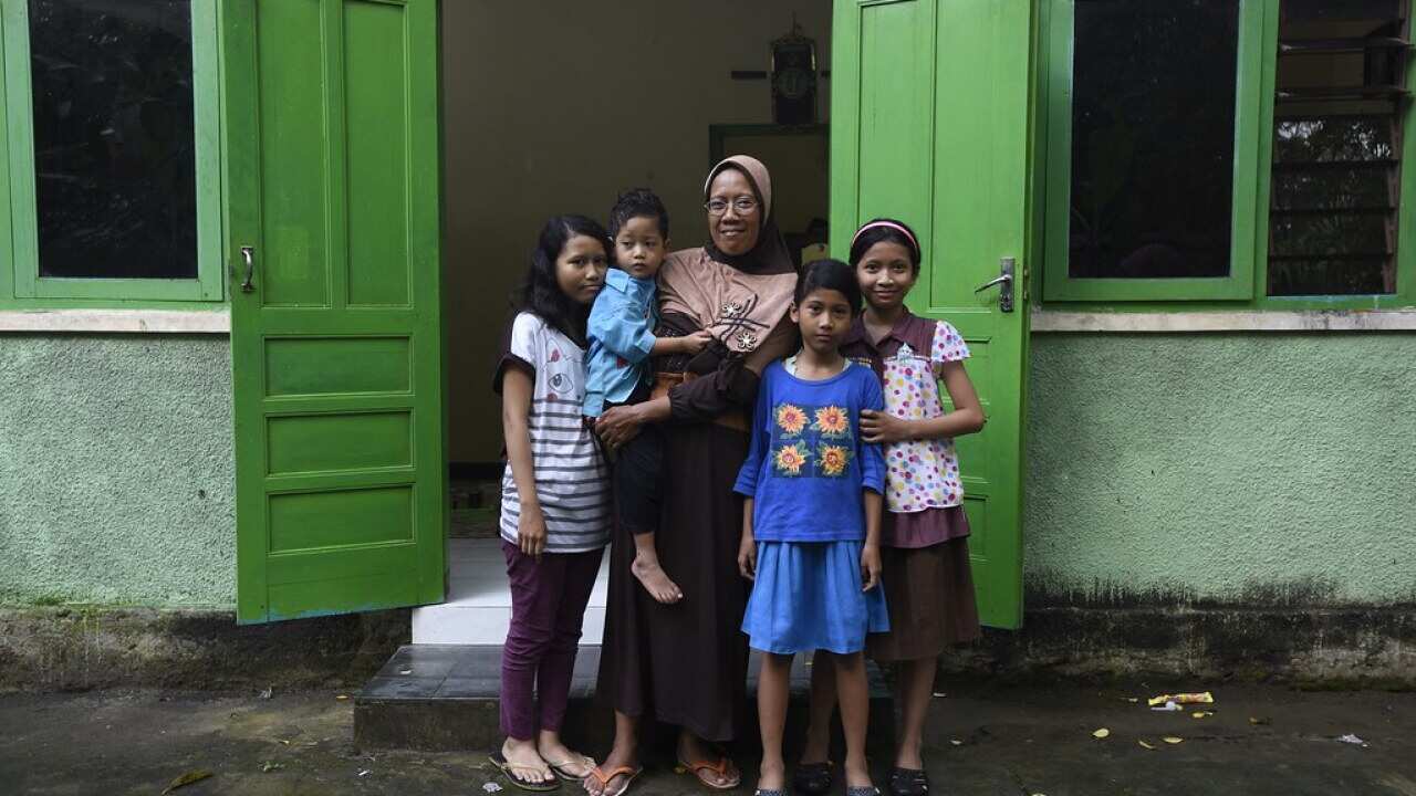 Mother and daughters.