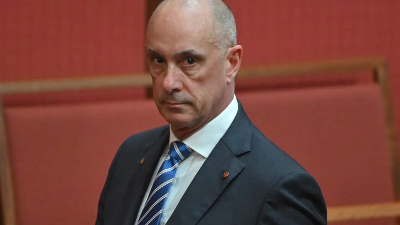 Man in suit and tie.