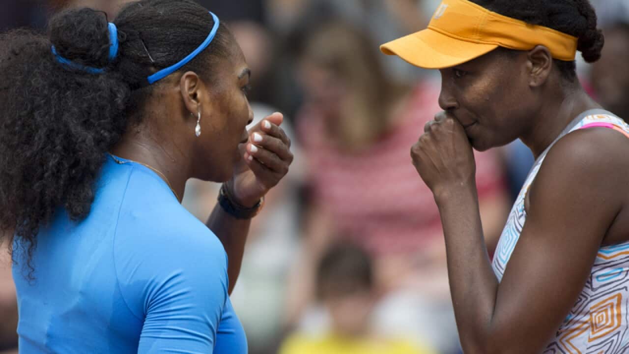 Venus, right, and Serena Williams of the U.S.