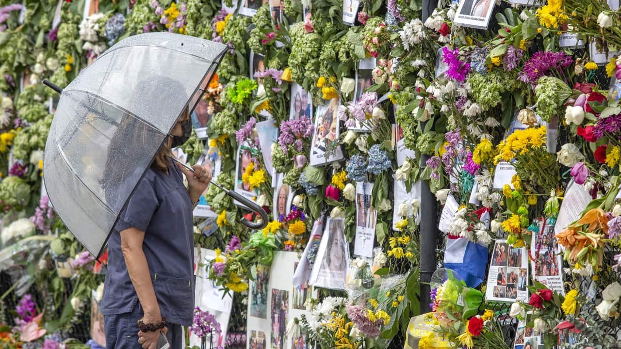 The US president met with families of victims as well as firefighters and other first responders who have been searching for life at the site