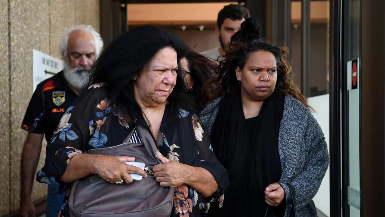 Family and supporters of victims leave the Supreme Court in Sydney, Thursday, September 13, 2018.