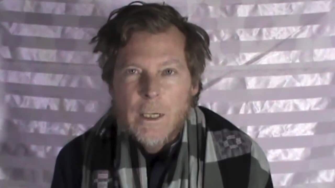 This image made from video released by the Taliban on Wednesday, Jan. 11, 2017 shows an Australian identified as Timothy Weeks