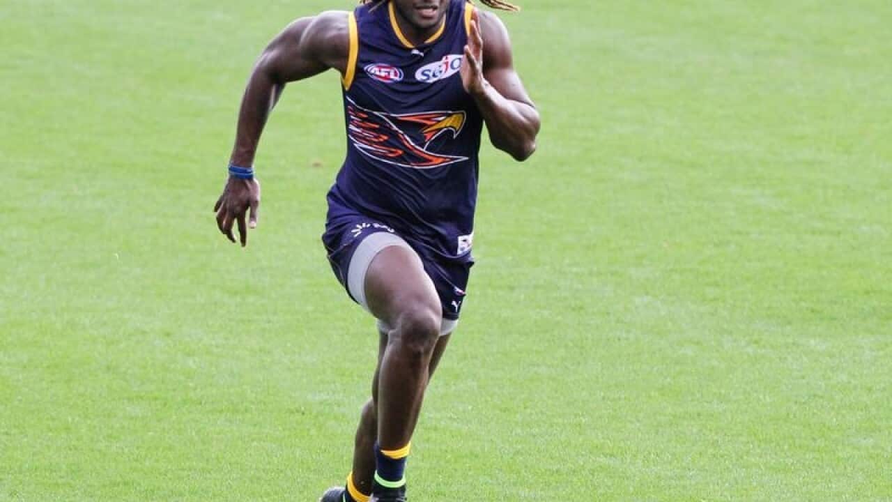 West Coast Eagles player Nic Naitanui runs during a training session.